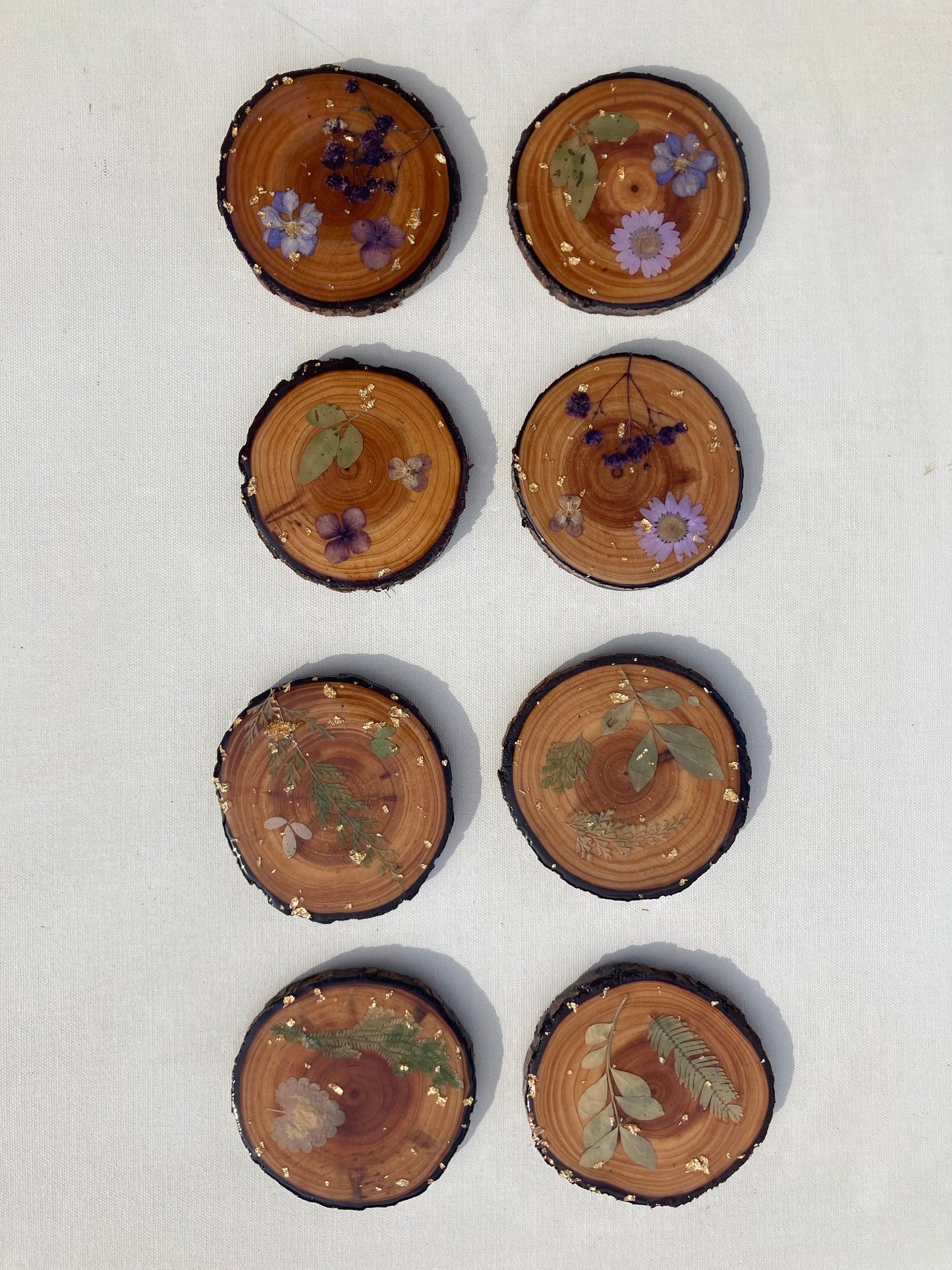 Wood slice coasters with real pressed flowers and leaves ~ custom resin wildflowers gold leaf boho cabin style ~ set of 4 forest rustic