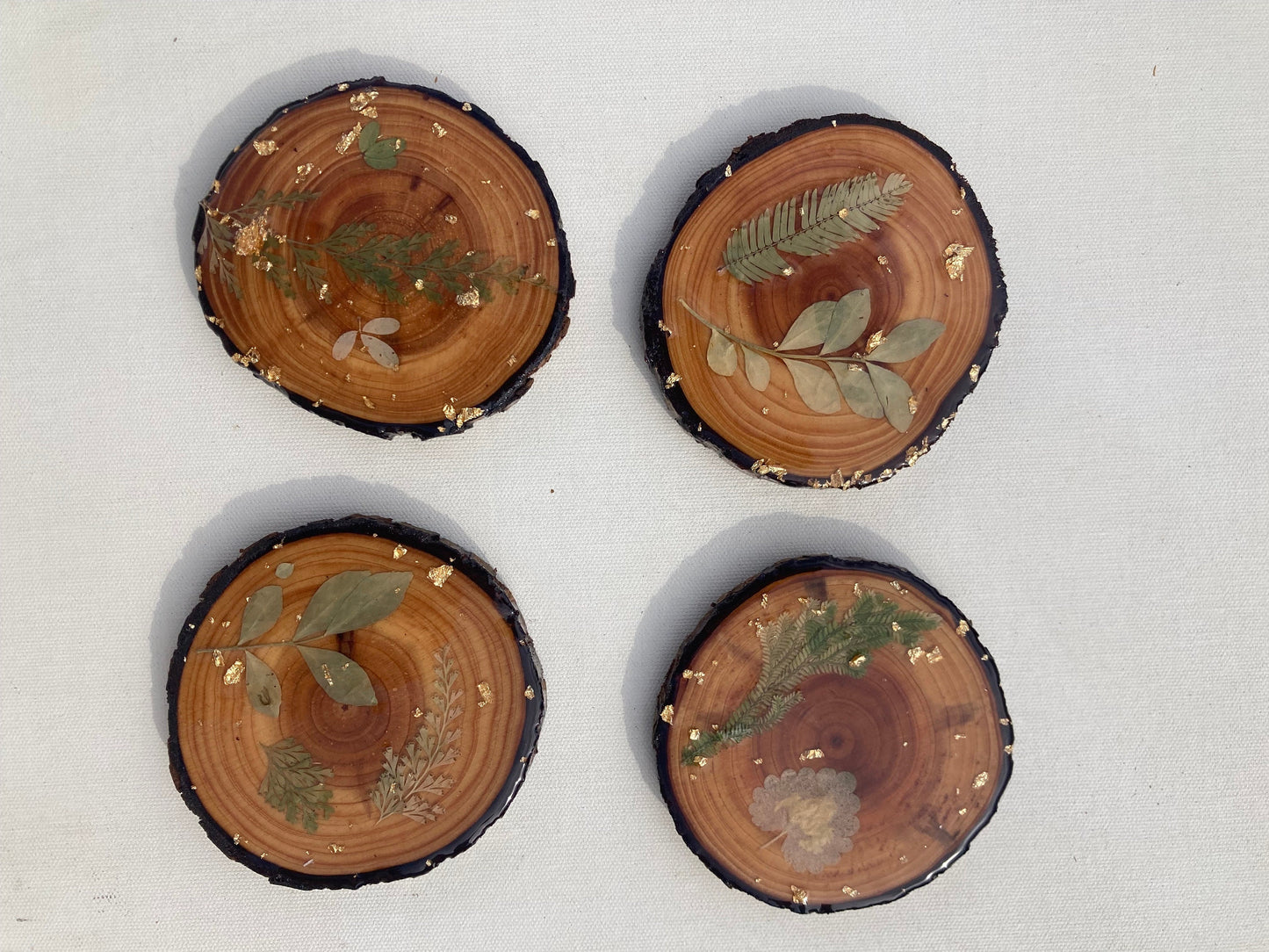 Wood slice coasters with real pressed flowers and leaves ~ custom resin wildflowers gold leaf boho cabin style ~ set of 4 forest rustic