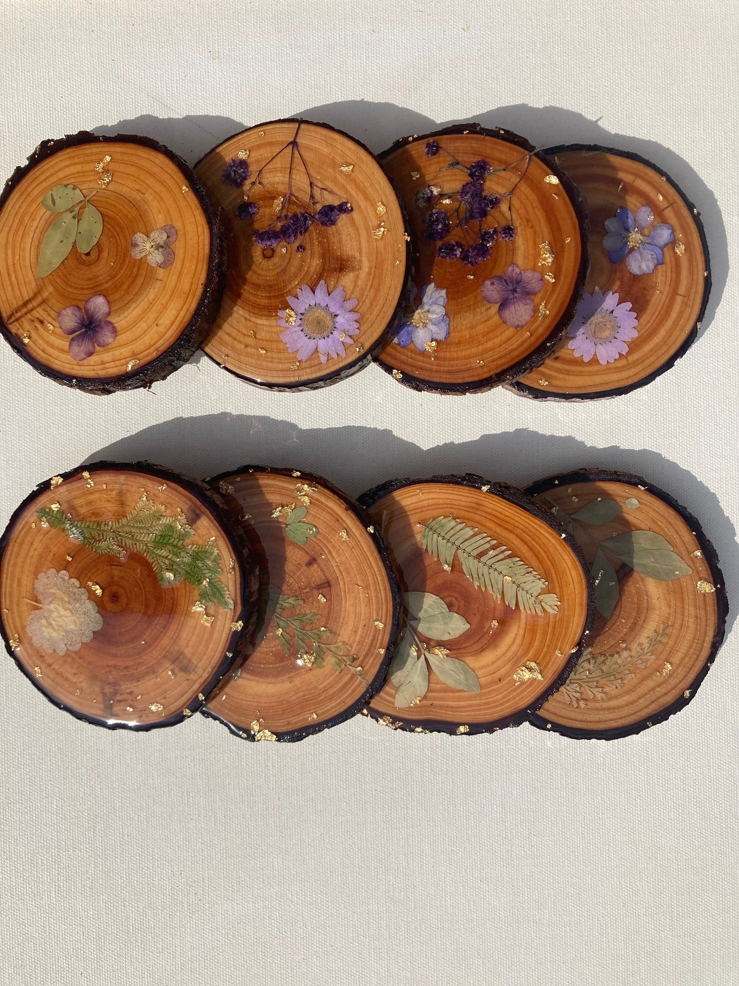 Wood slice coasters with real pressed flowers and leaves ~ custom resin wildflowers gold leaf boho cabin style ~ set of 4 forest rustic